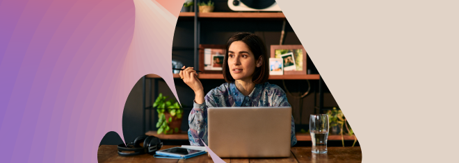 Woman thinking in front of her laptop