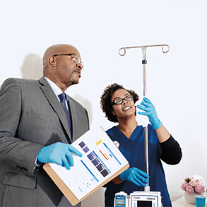 healthcare cleaning worker and manager standing together