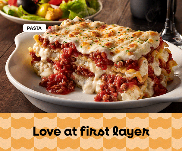 Olive Garden lasagna promotion featuring layers of pasta, three cheeses, and rich meat sauce.