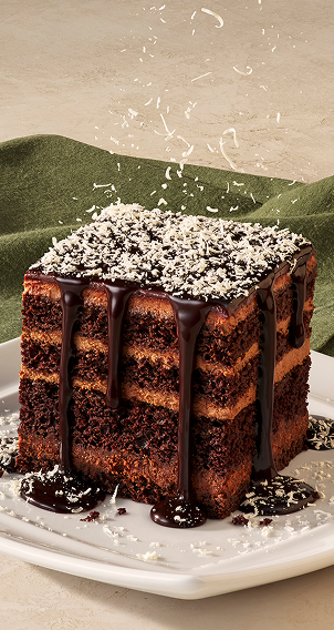 Image of Olive Garden's Chocolate Lasagna with creamy chocolate mousse, crushed wafers, and topped with rich chocolate sauce.
