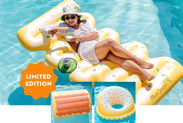 A woman on a pool float in a pool while holding a breadstick