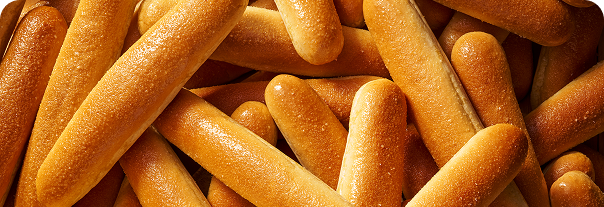 Image of Olive Garden's warm garlic breadsticks.