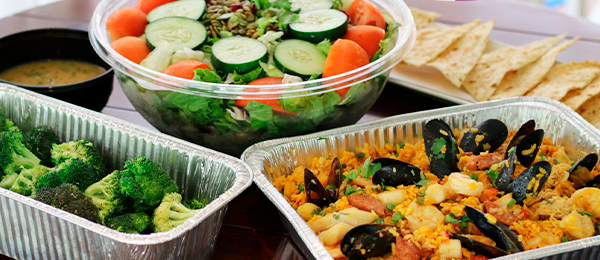 We bundle family favorites like Seafood Paella with favorite sides and salad to feed four.