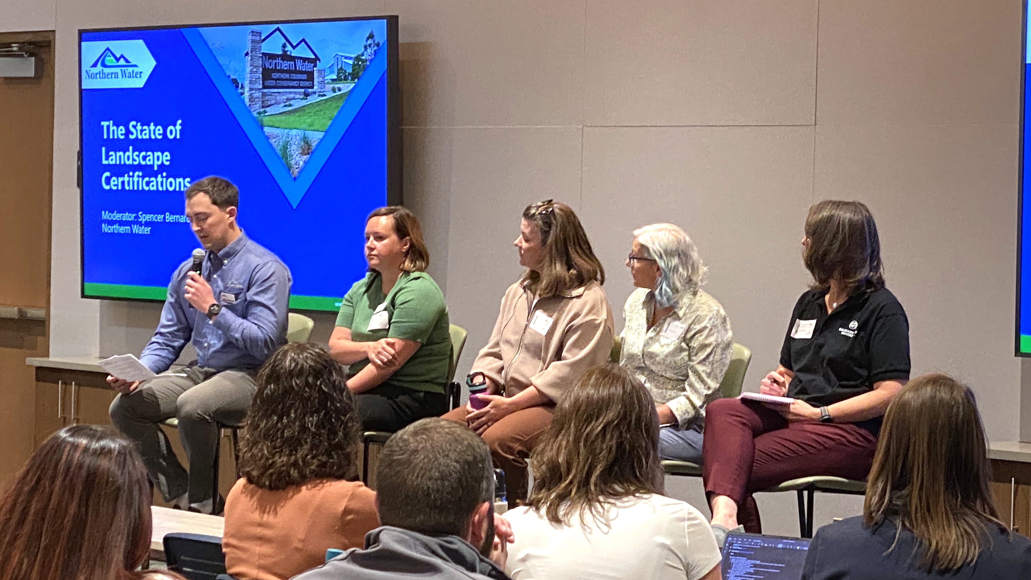 People listening to speaker