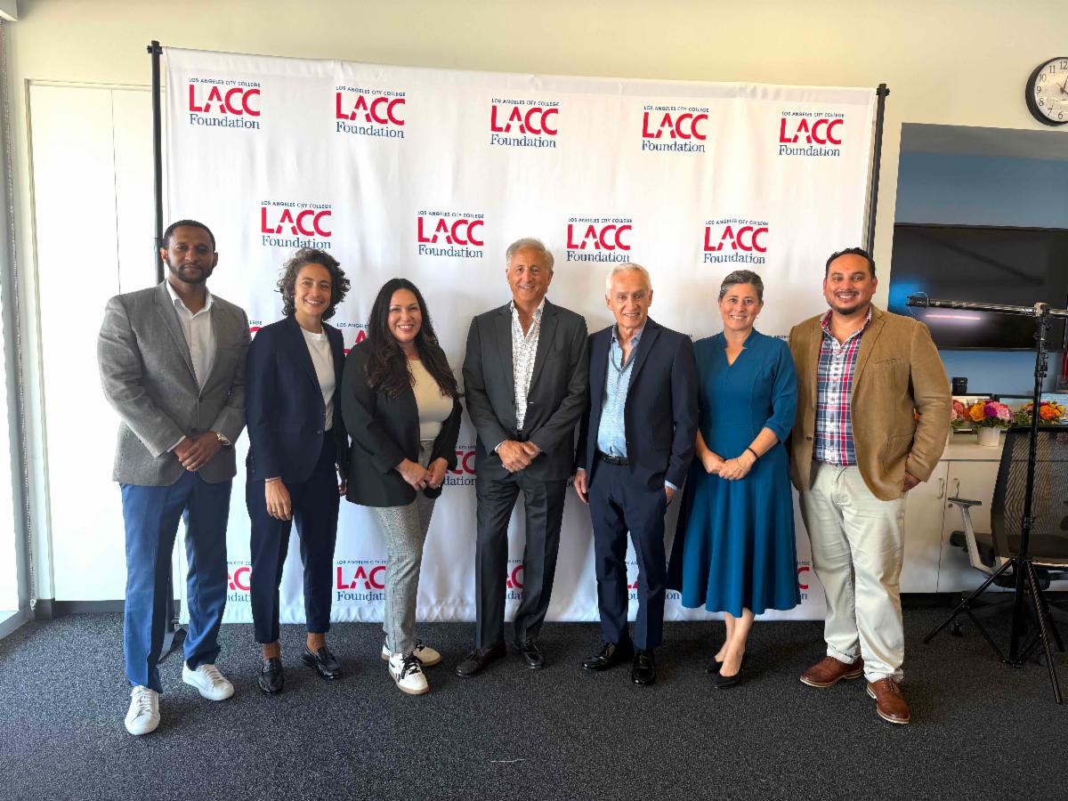 LACC faculty and staff with Jorge and Paola Ramos