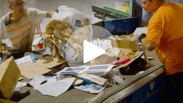 Seadrunar workers sorting recyclables.