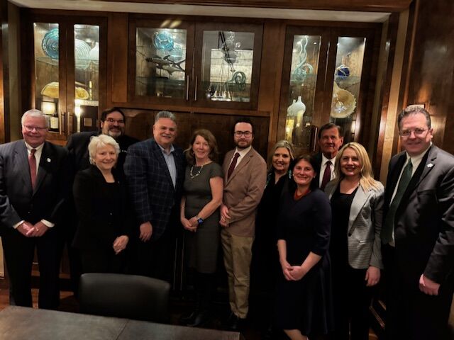 group of Wisconsin postsecondary and legislative leaders with MHEC staff