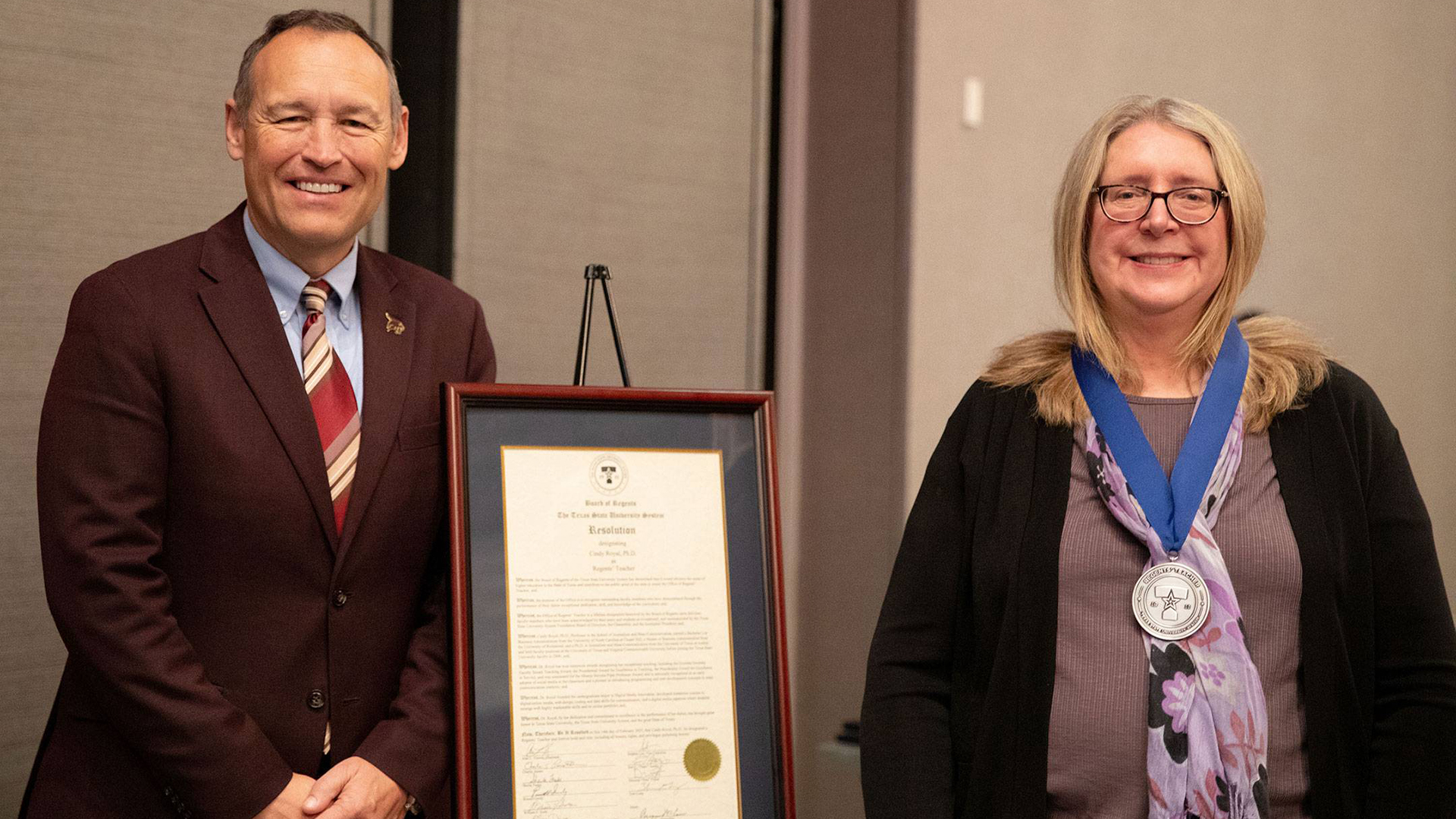 President Kelly Damphousse and Cindy Royal at Regents' Teacher Award ceremony.