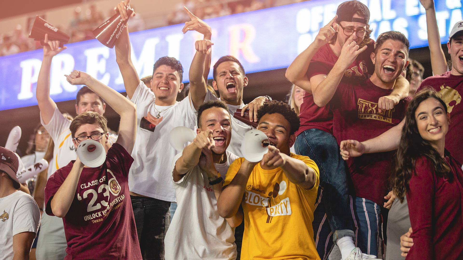 Many student cheering and happy
