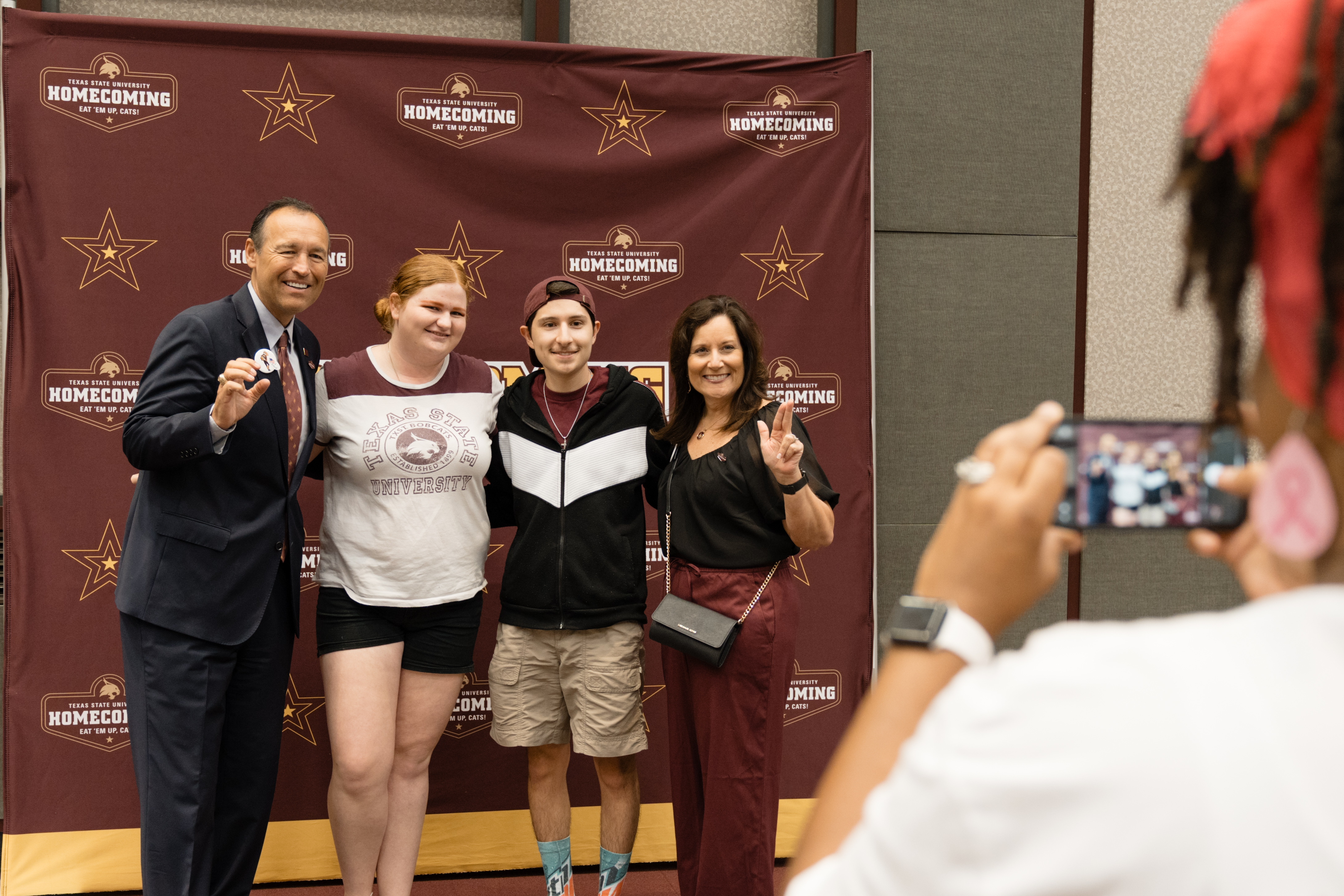 president damphousse posing for a group photo