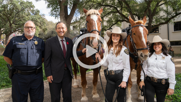 President damphousse and UPD officers with horses