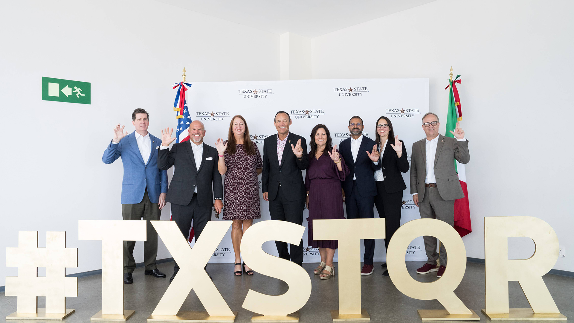 Group of people posing at the TXST Queretaro, Mexico campus.