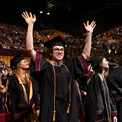 Graduate at commencement ceremony