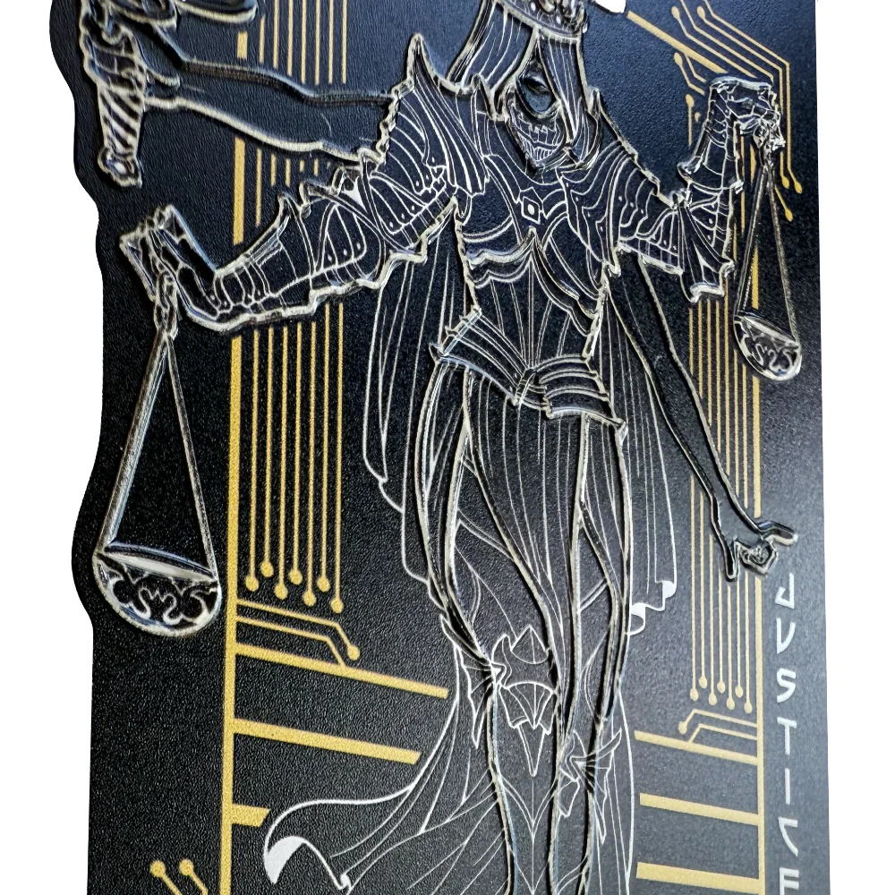 Close up of EFF's Lady Justice Braille Sticker