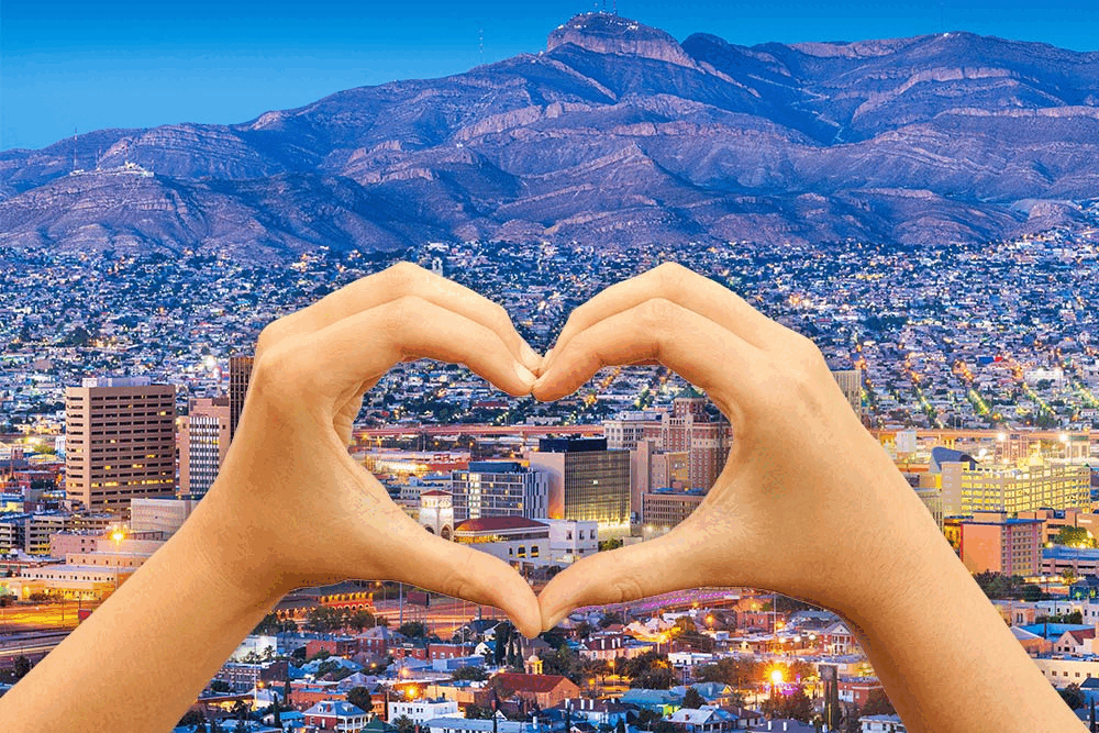An animated slideshow of images shows hands forming the shape of a heart over images of different US towns and cities.