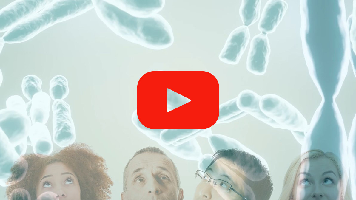 A still image from the video shows four people looking up with human chromosomes in the background and a YouTube "play" button.