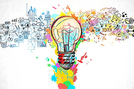 A colorful lightbulb with economic development and business-related images flowing around it illustrates the rise of entrepreneurship-led economic development strategies