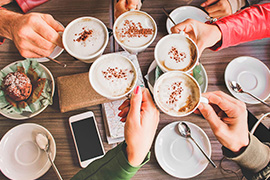 Friends gather at a coffee shop