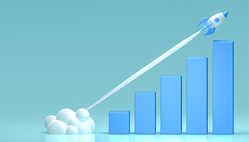 A rocketship blasts off above a steadily increase bar chart depicting economic growth