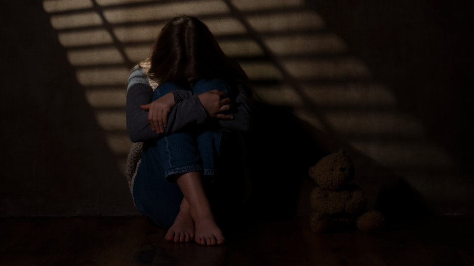 sad woman sitting on the floor