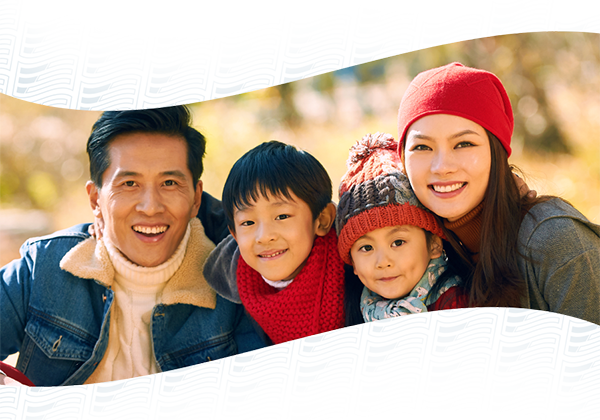 Happy family in winter gear